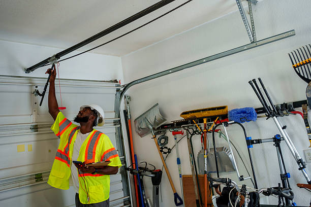 Professional Garage Door Panel Replacement technician working in Lamoni, IA